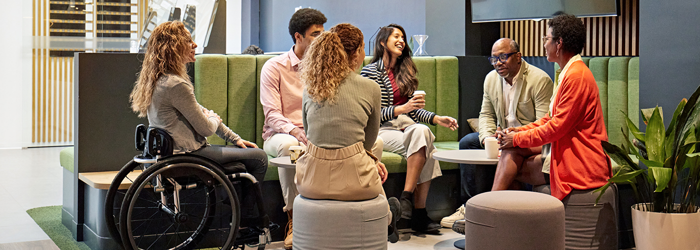 AIZ-17207-0823-Assurant ERG Pages-Mosaic-1400x5002 a group of people sitting on a couch